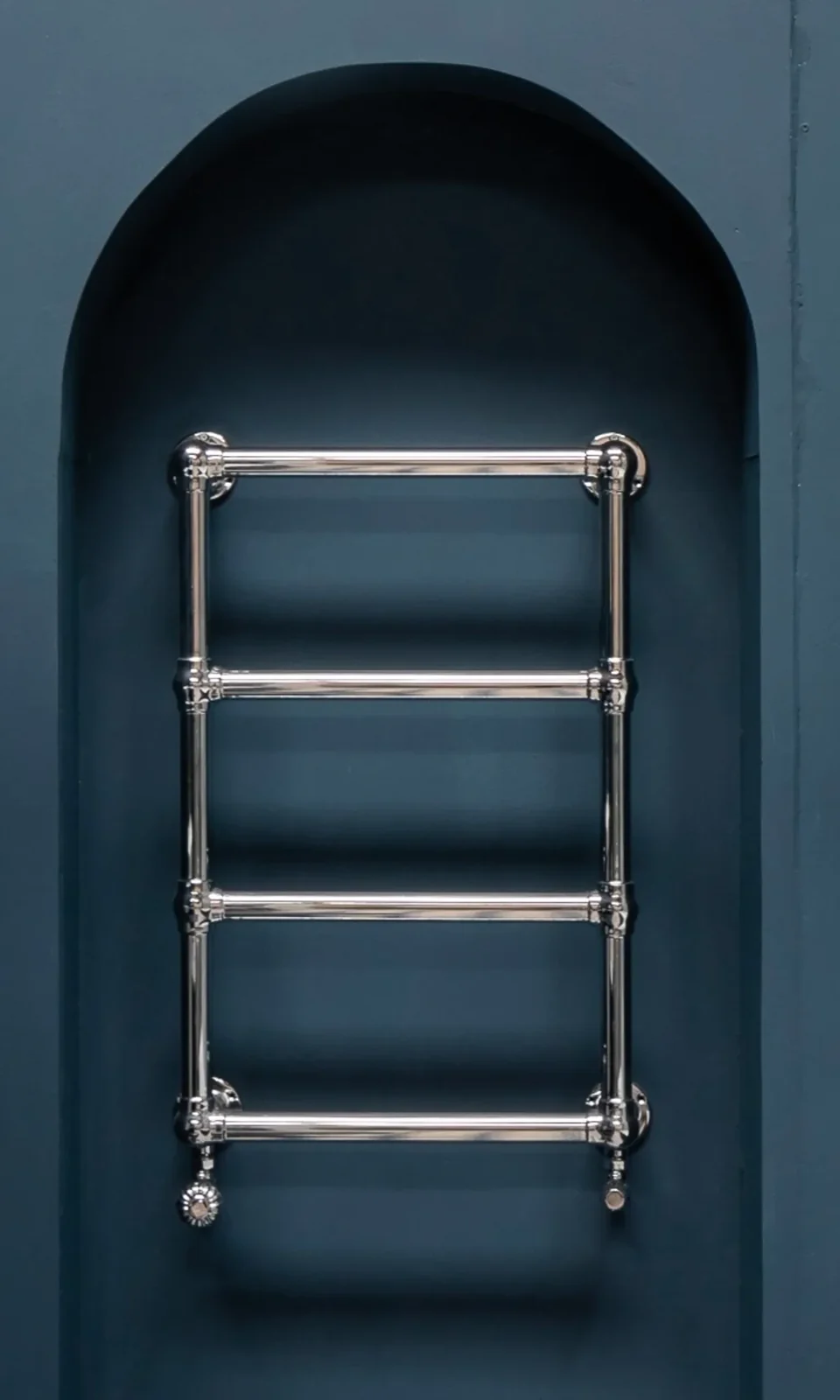 Bayswater traditional towel warmer in a blue bathroom